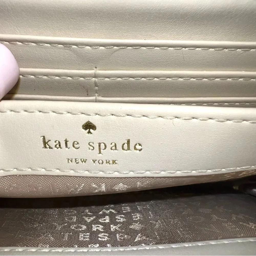 Kate Spade Neda Signature Beige and Pink Stripe Zip Around Wallet